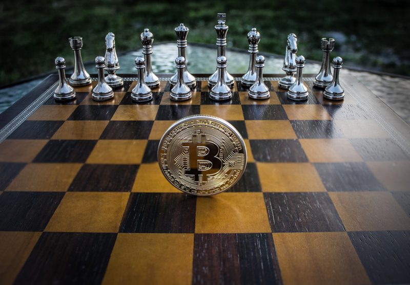 Bitcoin on chess board